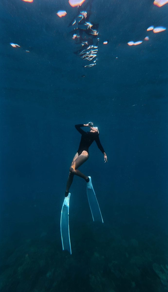 Freediving adventure in deep blue water