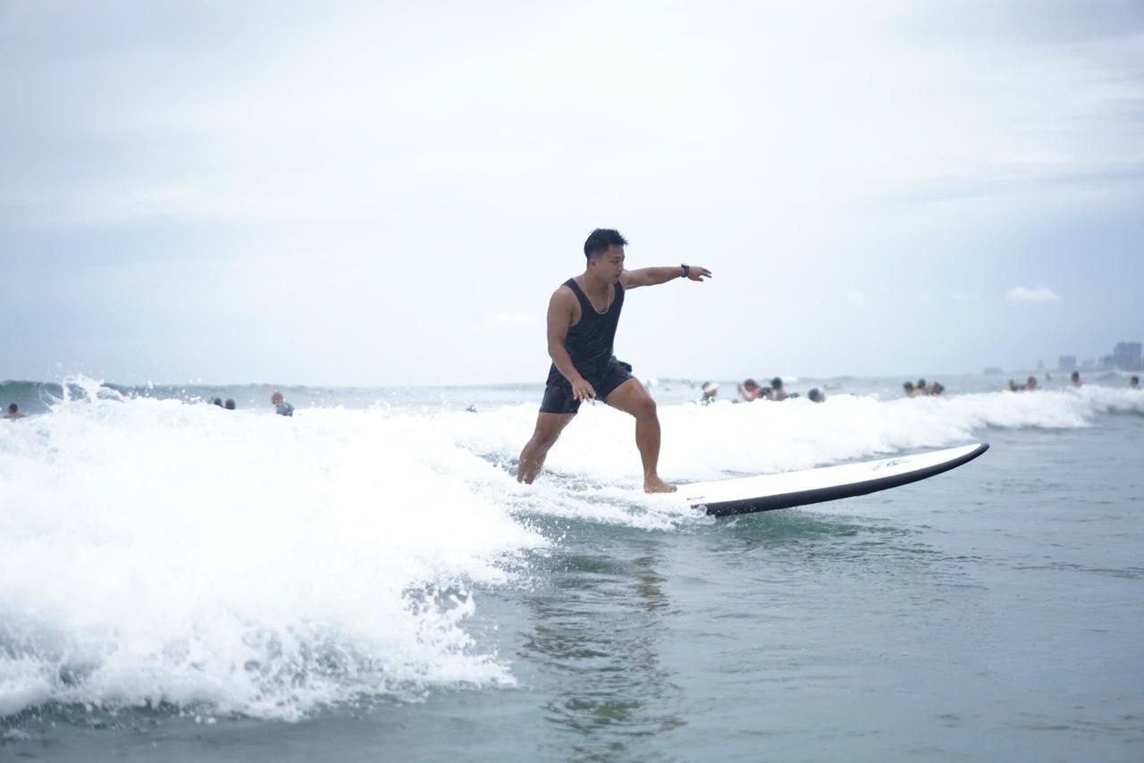 Carving through whitewater at Man Thai